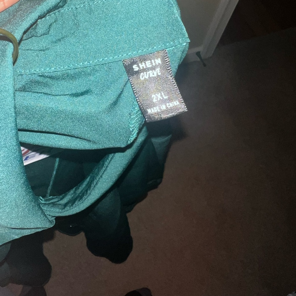 Ladies dark green oversized top.